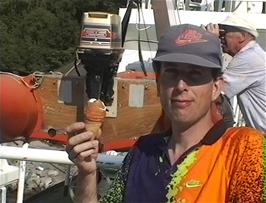 Michael enjoys his ice cream on board the Geirangerfjord cruise boat as it waits to leave Geiranger